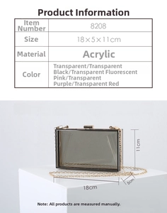 Detail view of transparent smoke gray acrylic evening clutch with gold metal chain strap
