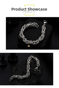 Macro detail of men's braided stainless steel chain bracelet with metallic texture