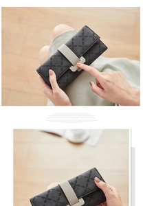 Macro view of long trifold wallet featuring floral embossing and gold metal clasp detail