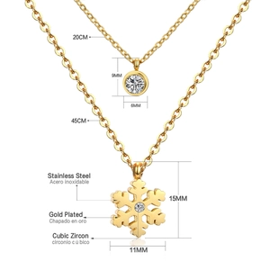 Detail of gold-plated stainless steel necklace set with snowflake and zircon pendant