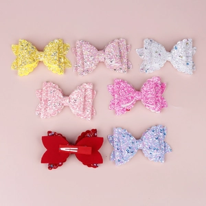 Lot de 7 barrettes à nœuds pailletés triple couche colorées pour filles sur rose