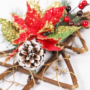 Star shaped Christmas wreath with pine cones and red berries for home wall decor