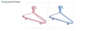 Detail showing non-slip hangers in pink and blue colors for wet and dry clothes