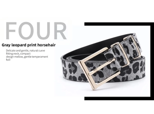 Close-up of luxury leopard print horsehair belt with golden square metal buckle