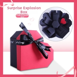 Detail of multi-layer explosion gift box with Just for You ribbon and photo slots
