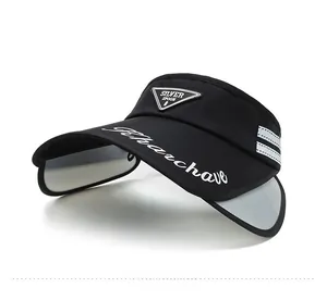 Macro detail of breathable black sun visor with adjustable side flaps and metal logo