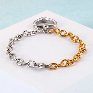 Minimalist two-tone heart chain bracelet in gold and silver stainless steel