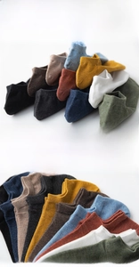 Detailed view of elastic cuffs and reinforced heels on multi-color cotton ankle socks