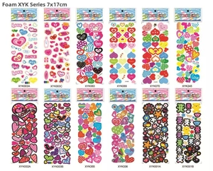 Close-up of assorted 3D foam sticker sheets featuring hearts, flowers, and animals