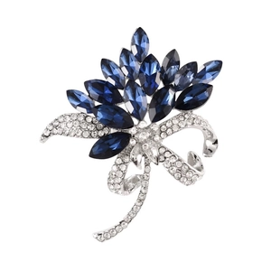 Elegant silver-toned crystal brooch featuring blue marquis and white round rhinestones