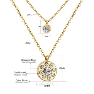 Detailed spec view of gold plated stainless steel cross necklaces with zircon inlays