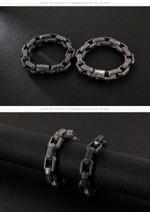 Macro view of men's punk stainless steel chain bracelets with vintage floral engravings