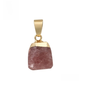 Macro shot of faceted strawberry quartz pendant with elegant gold metal clasp on white background