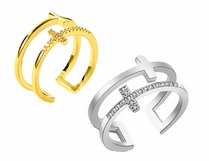 Detail showing gold and silver double-layer cross rings with inlaid rhinestones