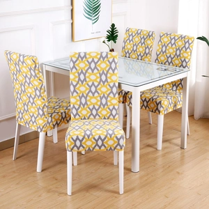 Detail of yellow and grey geometric pattern on elastic dining chair covers set of 4