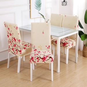 Detailed view of elastic chair cover with pink floral pattern on high-back dining chair