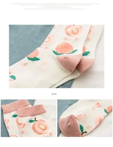 Detail shot of cotton socks featuring peach patterns and contrast heel in Korean style