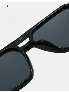 Close-up of comfortable integrated nose pads on classic black square sunglasses