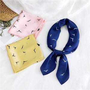 Elegant 70cm silk-like scarf with minimalist bird print in pink, yellow, and blue