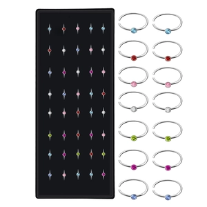 Set of 40 stainless steel C-shaped nose hoops with colorful sparkling crystals in a box