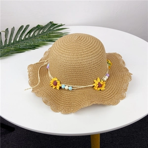 Cappello di paglia per bambina con perline girasole e tesa ondulata color kaki