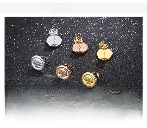 Three-color titanium steel Tree of Life octagon studs in gold, silver, and rose gold finishes