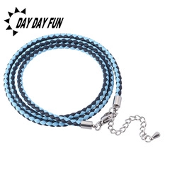 Close-up of blue braided leather bracelet with silver lobster clasp and extension chain