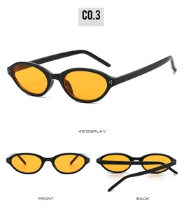 Vues détaillées de lunettes ovales noires avec verres orange et rivets argentés