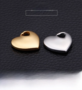 Polished stainless steel heart charms in gold and silver finish for jewelry making