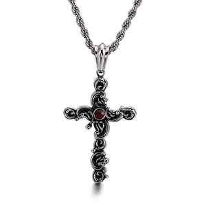 Vintage stainless steel cross necklace with a red gemstone on a silver twisted chain