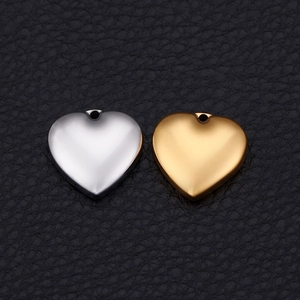 Polished stainless steel heart pendants in gold and silver finish for DIY jewelry
