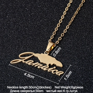 Detailed view of gold Jamaica map pendant with dimensions on matte black background