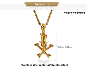 Close-up of gold skull cross pendant in stainless steel with detailed measurements