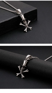 Detailed view of silver skull pendant with top hat and crossbones on twist chain