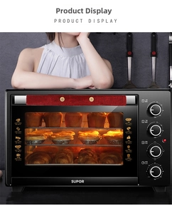 Close-up of black electric oven featuring red fabric handle cover and multi-layer baking