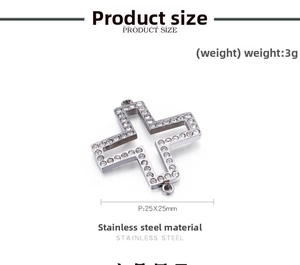 Macro shot of 25x25mm hollow stainless steel cross pendant with inlaid white rhinestones