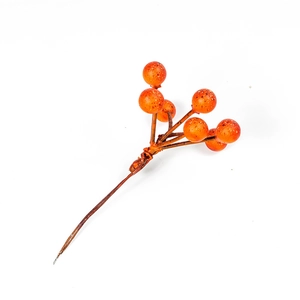 Artificial red berry spray branch for home decor on a clean white background