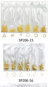 Detail view of assorted gold alloy nail art studs and metallic charms in clear packaging