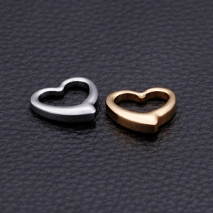 Polished stainless steel heart-shaped hollow pendants in gold and silver finishes