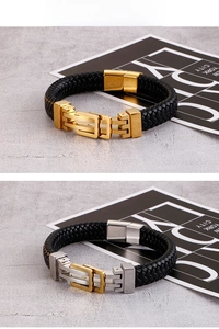 Detail of black woven leather men's bracelets with gold and silver magnetic buckles