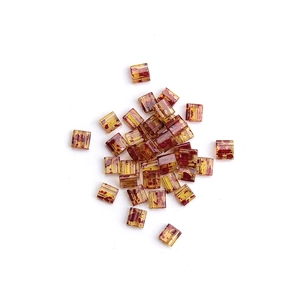 Golden TILA glass beads with dark brown ink pattern for DIY jewelry making