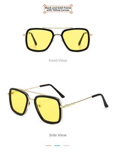Detailed view of vintage square aviator sunglasses with black gold frame and yellow lenses