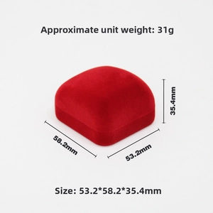 Macro view of a red velvet square jewelry gift box with dimensions 53.2 x 58.2 x 35.4mm