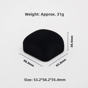 Close-up of black velvet jewelry gift box showing dimensions 53.2 x 58.2 x 35.4mm