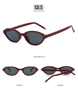 Vues détaillées des lunettes de soleil ovales rouge foncé avec verres gris et accents argent