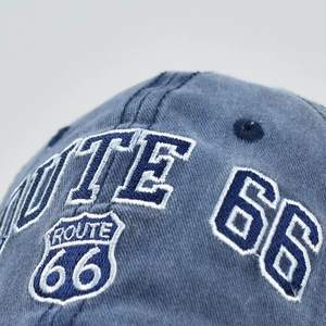 Washed blue cotton baseball cap with Route 66 embroidery and vintage distressed finish