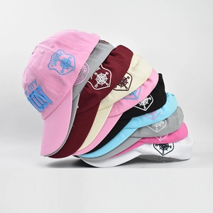 Boston baseball caps with 3D embroidery stacked in multiple colors on a plain background