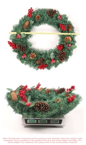 Detail view of 60cm Christmas wreath with pine cones being measured and weighed