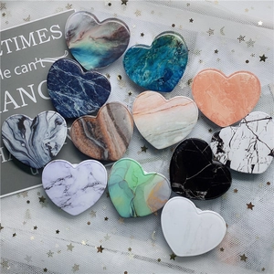Collage of heart-shaped marble pattern folding phone sockets in assorted colors
