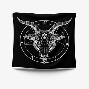 Detailed view of bohemian wall tapestry featuring white Baphomet line art on black fabric
